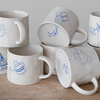 Wax Relief Illustration Mugs With Secret Image on Bottom Creative Co Op Home - Mugs & Glasses